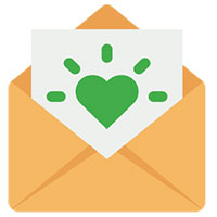 A green shining heart on a letter opening from an envelope