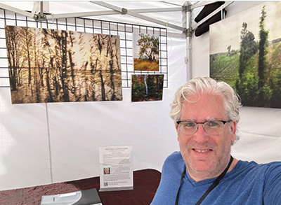 Steve showing his photographs, 2018