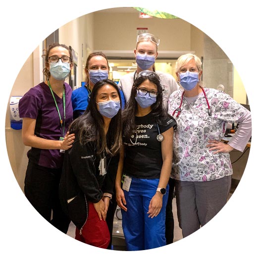 Group photos of some hospital staffs with their mask on.